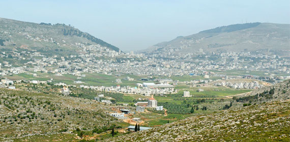 Shechem in the valley between Mount Gerizim and Mount Ebal